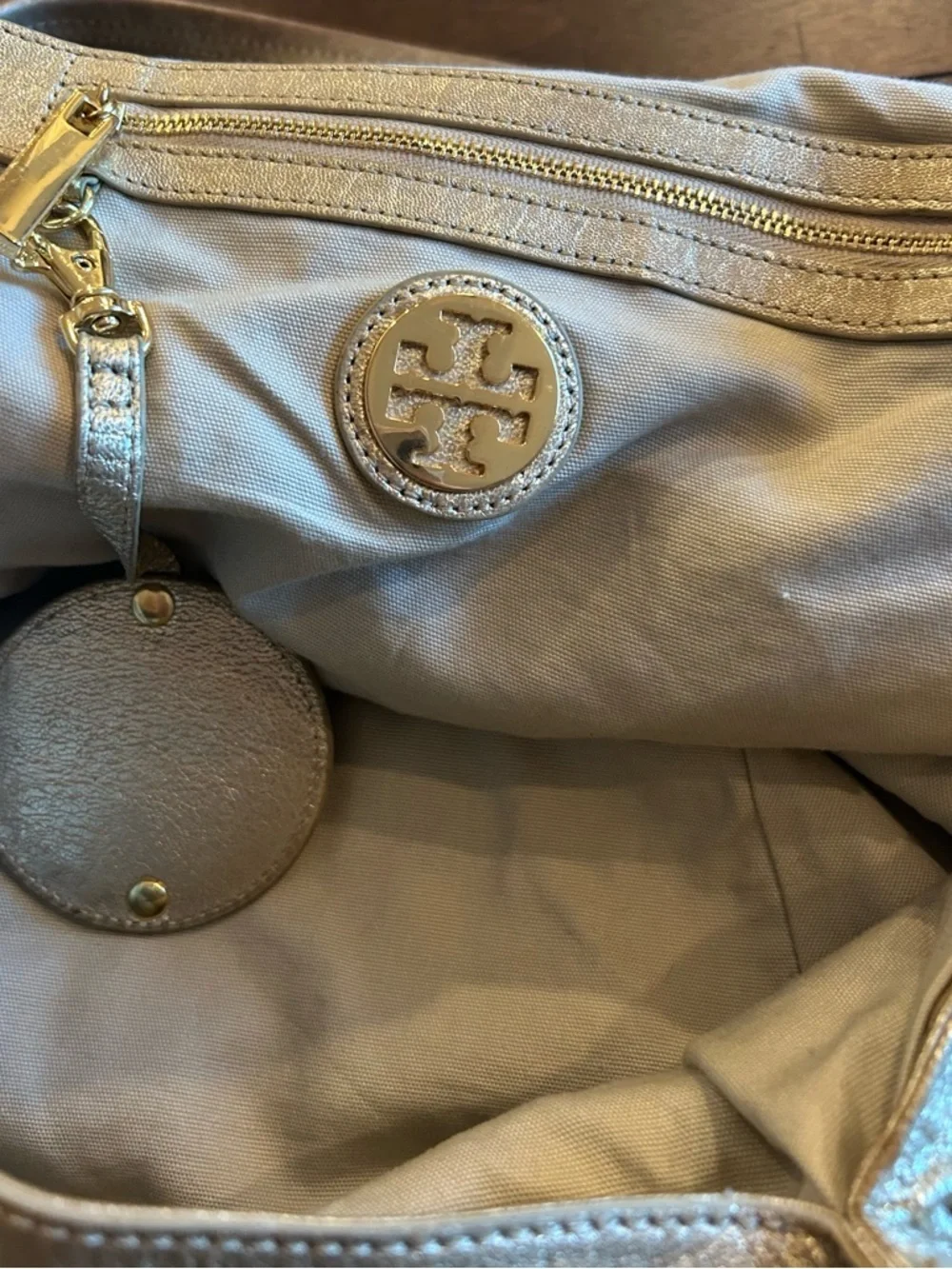 The Tory Burch Shimmer Gold Dean Hobo Bag MSRP 590.00